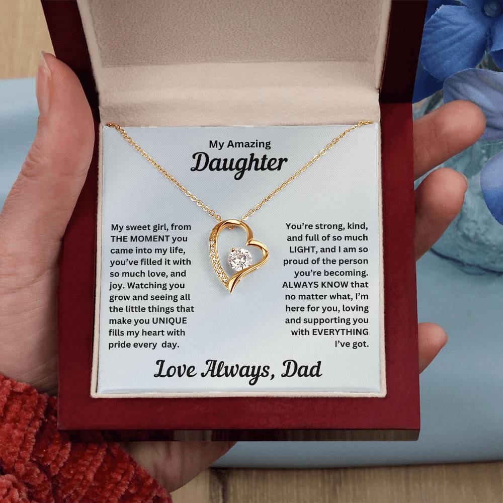 Hand holding Dad to gift to daughter with Forever Love necklace and special sentiment in a luxury box