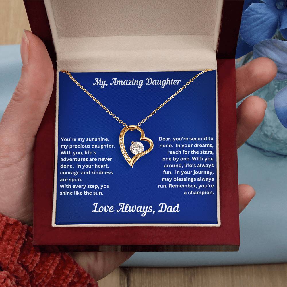 Hand holding Daughter gift from dad with forever love necklace and unique message in a luxury box