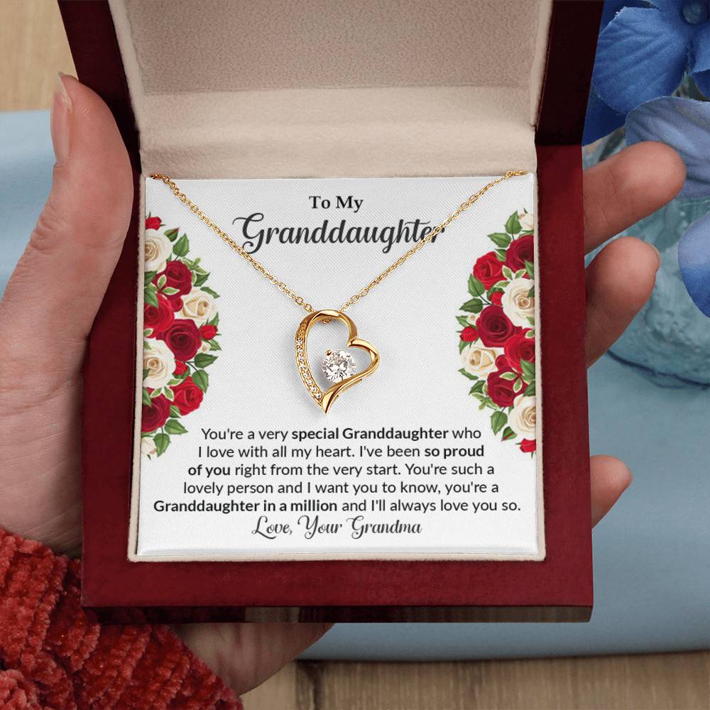 Hand Holding Granddaughter gift from grandma with Forever Love Necklace With Unique Message In Luxury Box