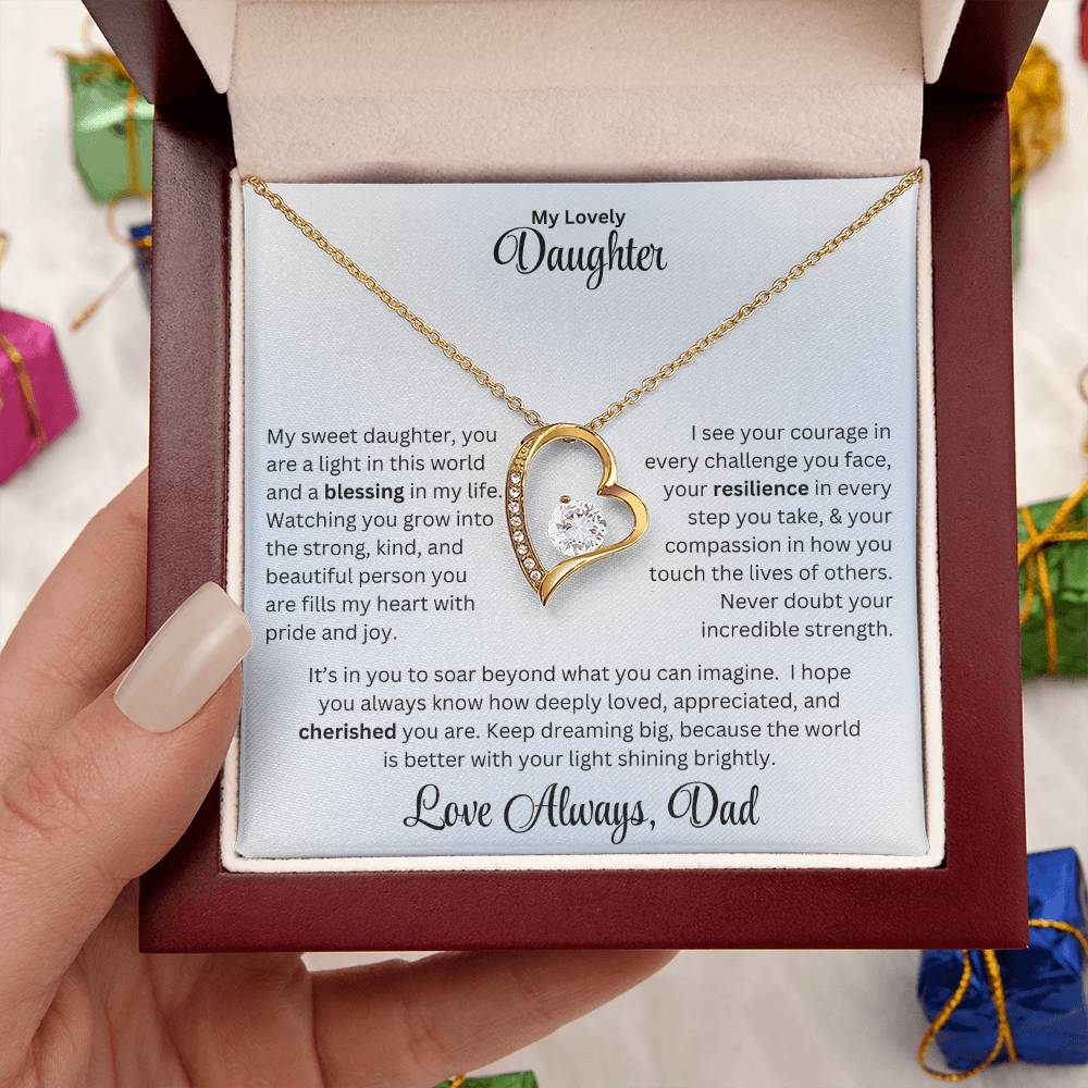 Hand holding Daughter gift with forever love necklace and special message in luxury box