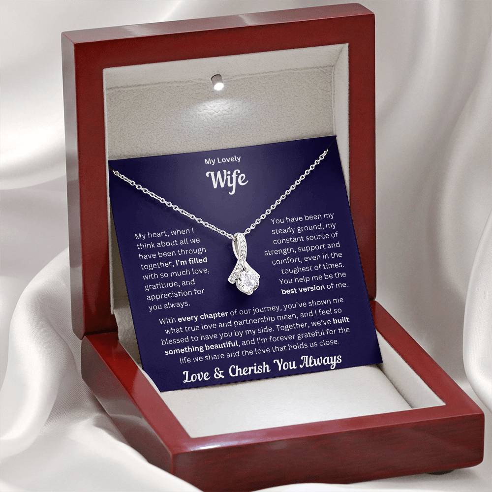 Wife gift with alluring necklace and special message in a luxury box with LED on