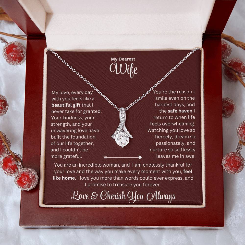 Wife gift with alluring beauty necklace and special sentiment in a luxury box with holiday props