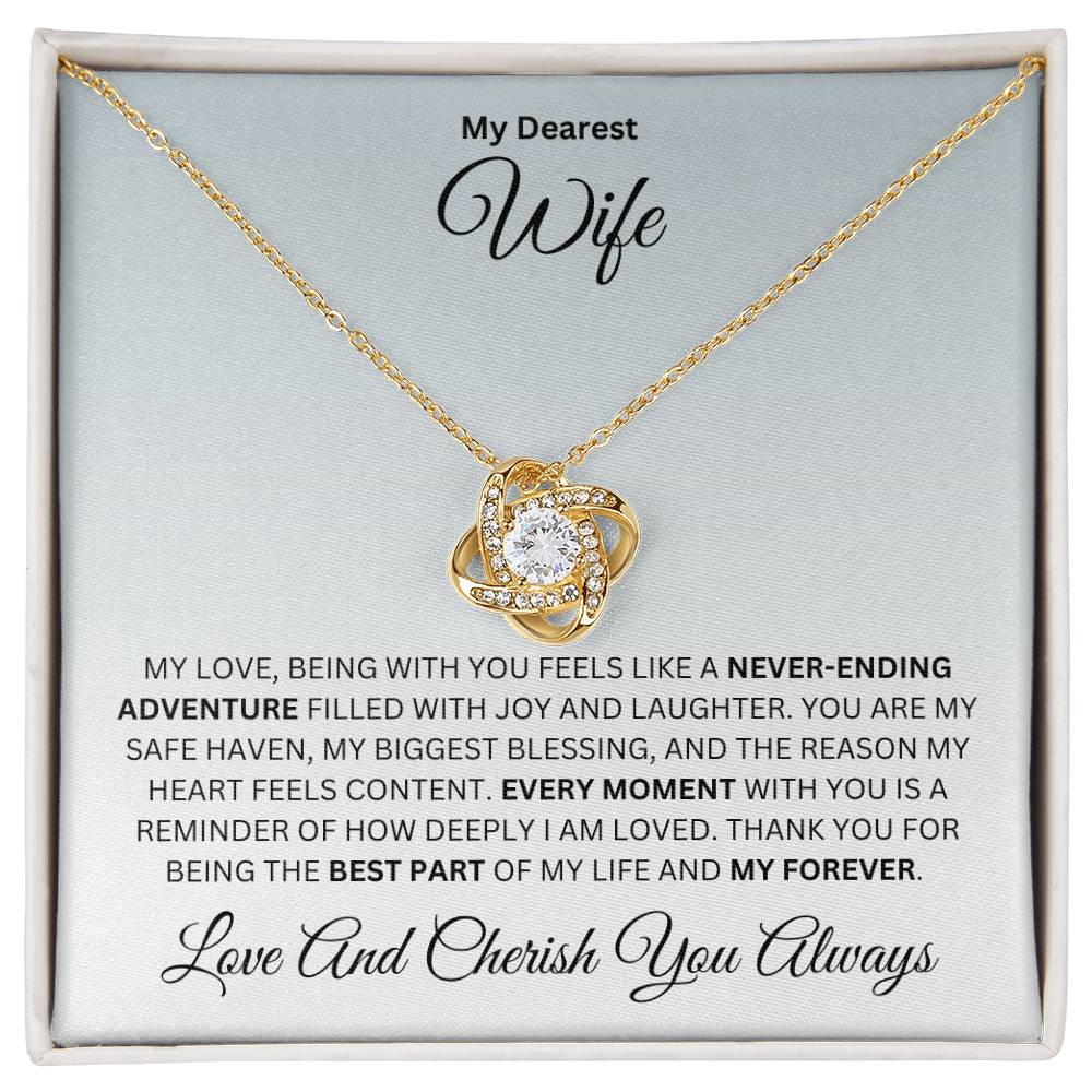 Wife gift with love knot necklace and special heart warming sentiment in a standard box
