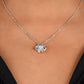 Love Knot Necklace In 14K White Gold Finish Worn On Neck