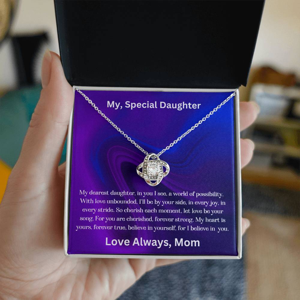 Daughter gift from mom with the love knot necklace and special message in two tone box