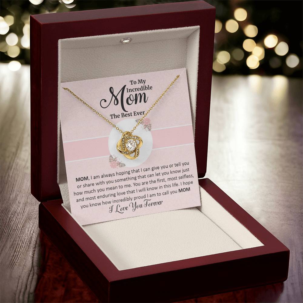 Gift for mom with love knot necklace and special message in luxury box with spotlight on