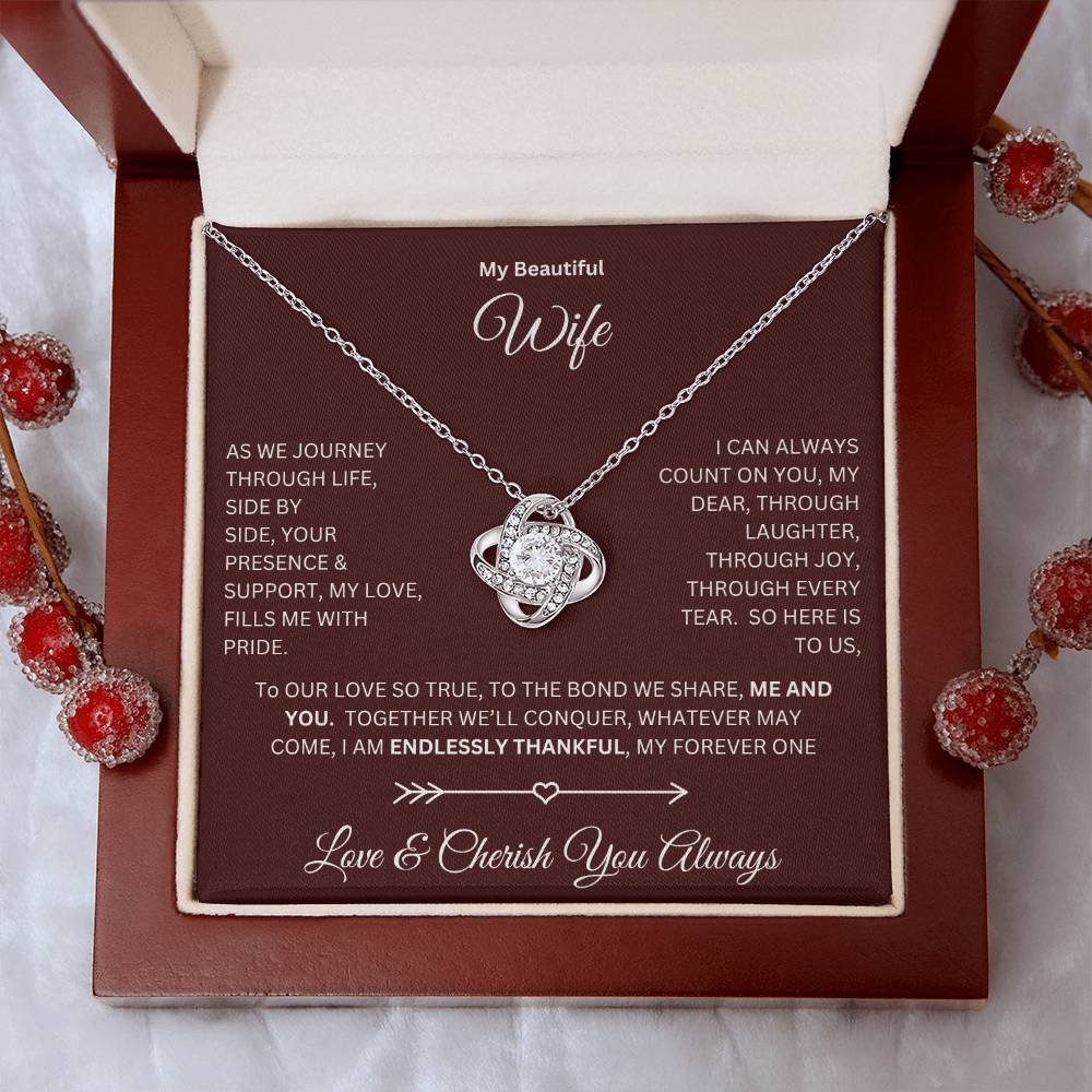 Wife gift with love knot necklace and special message in a luxury box with props