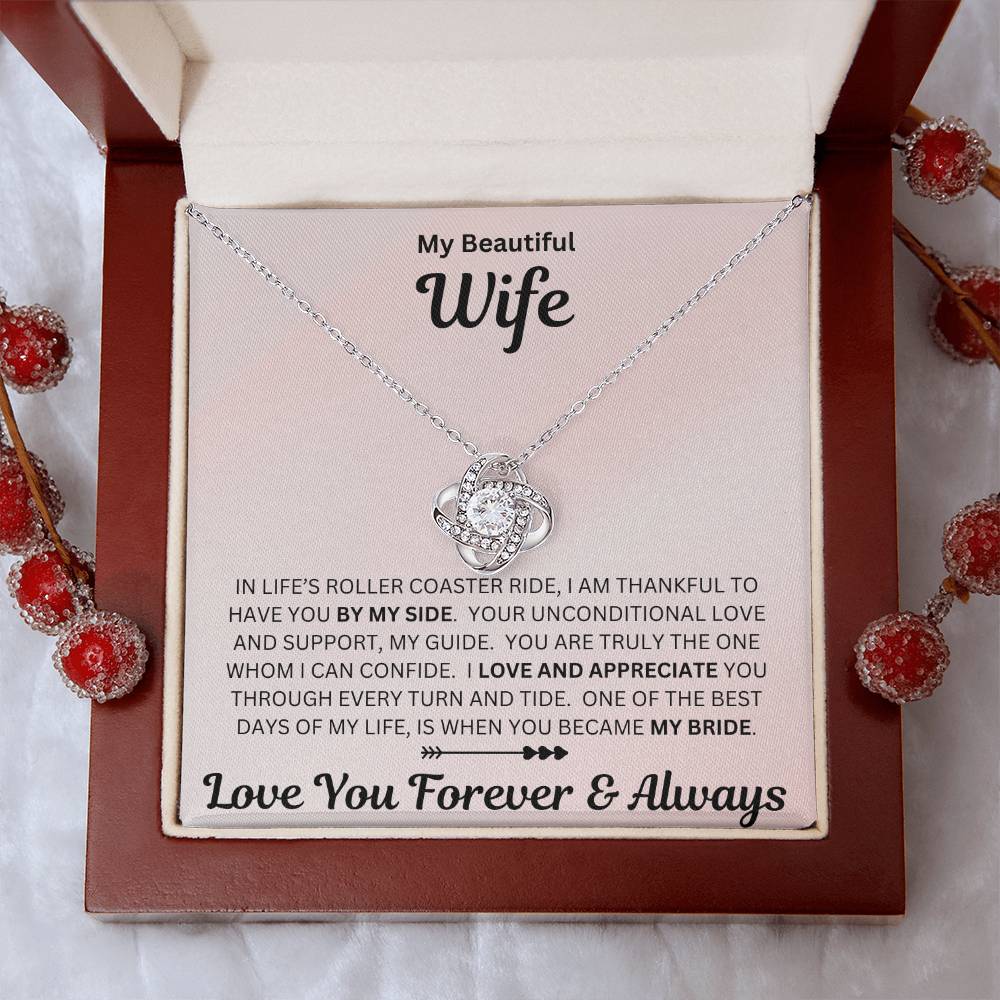 Wife gift with love knot necklace and special sentiment in a luxury box with props