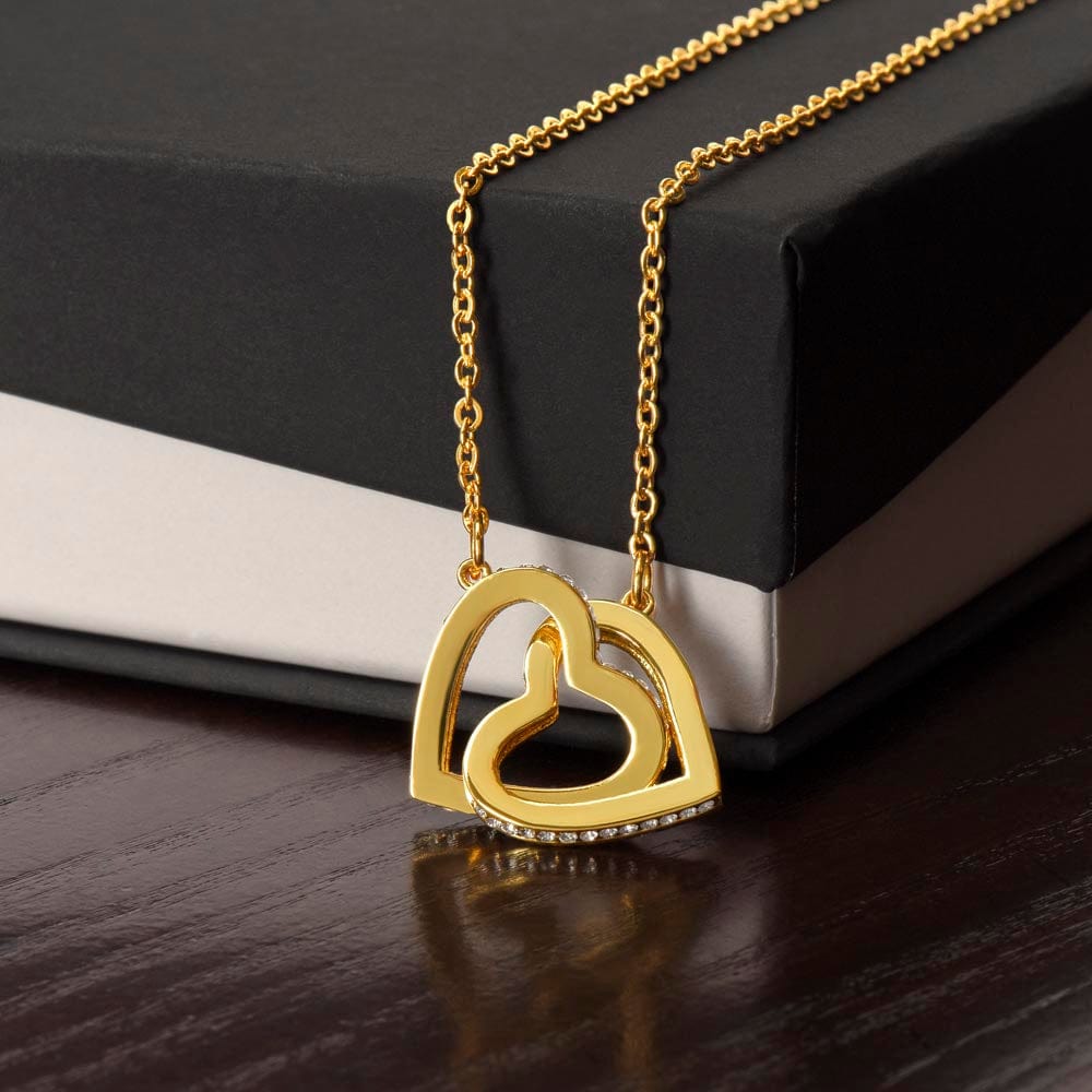 Close view of interlocking heart necklace