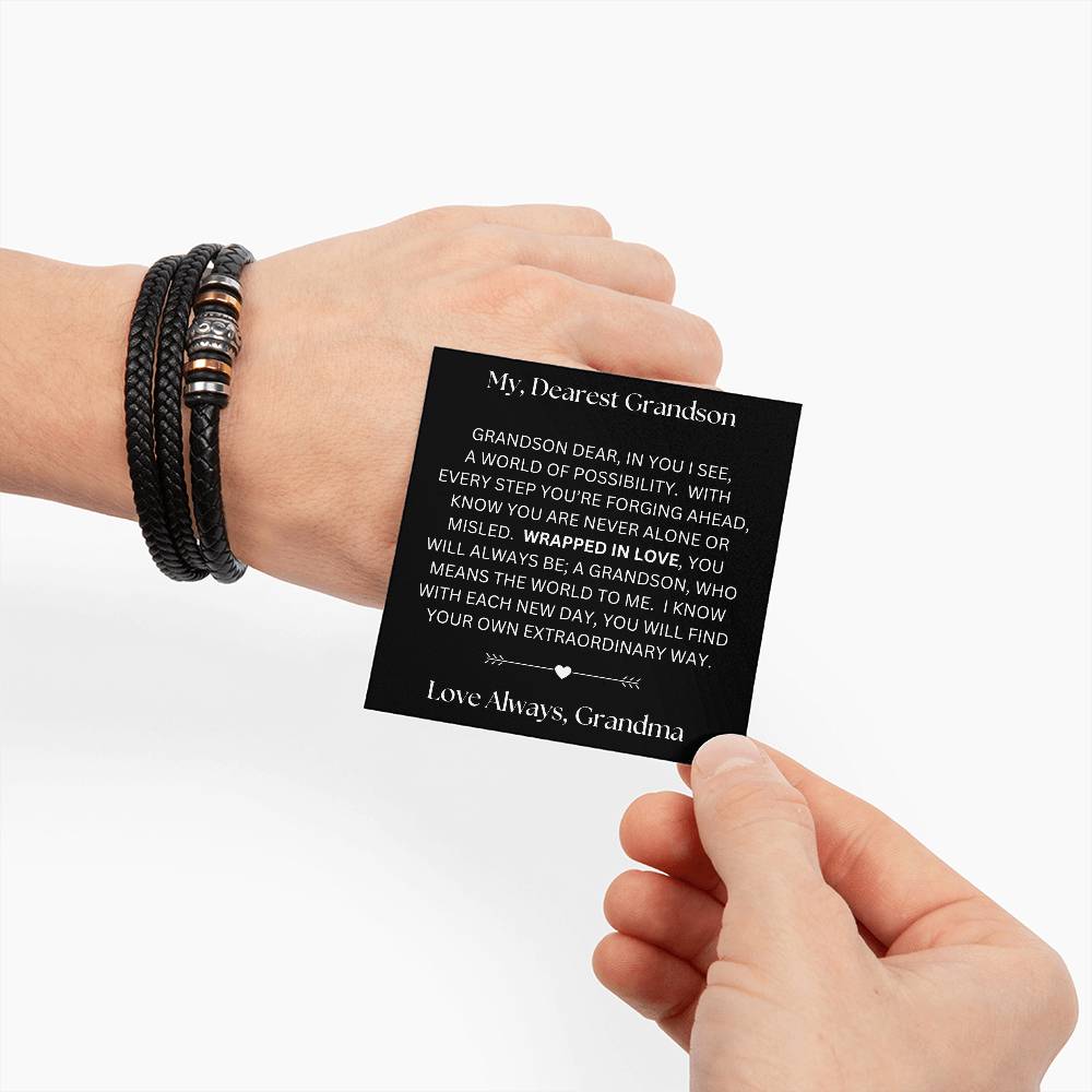 Hand wearing the bracelet and holding the message card