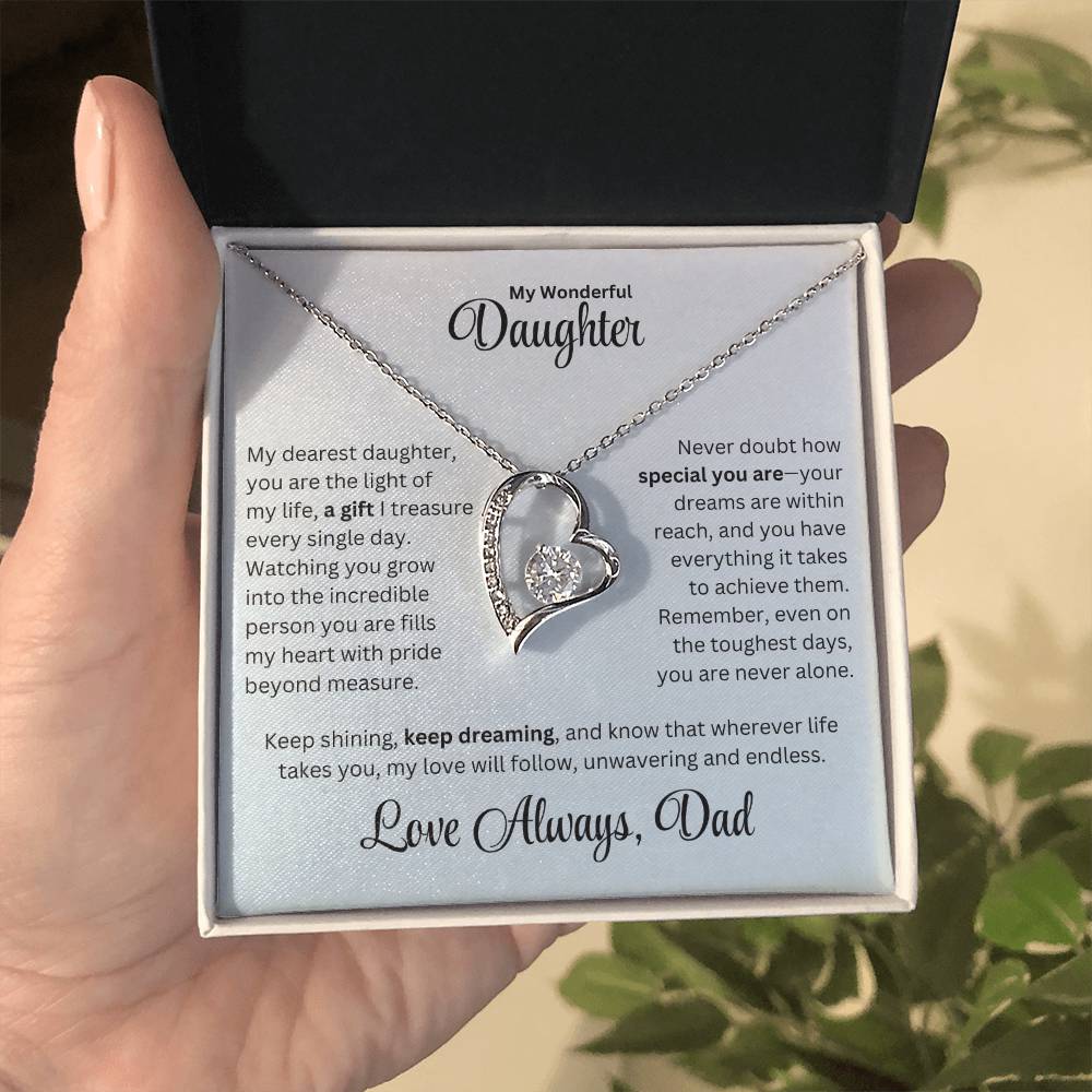 Hand holding Daughter gift from dad with forever love necklace and special message in a standard box