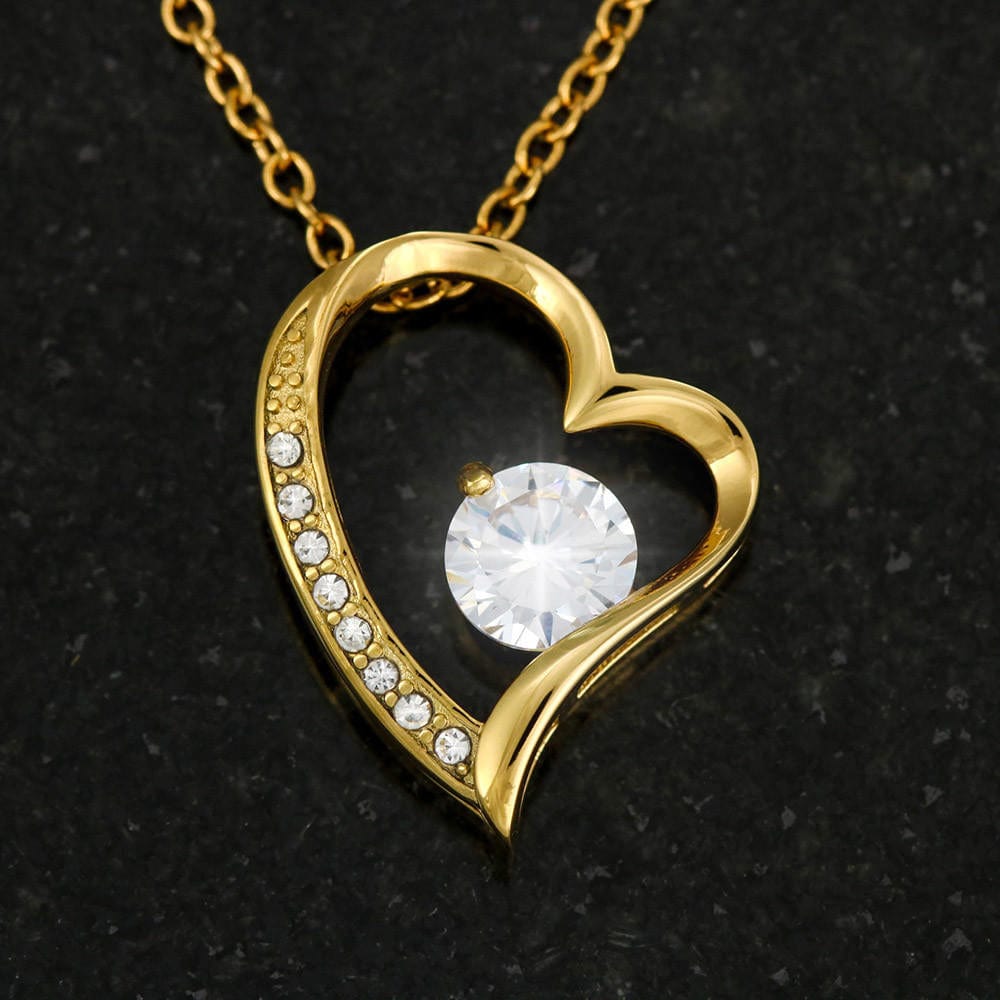 Close view of forever love necklace in 18 K yellow gold finish