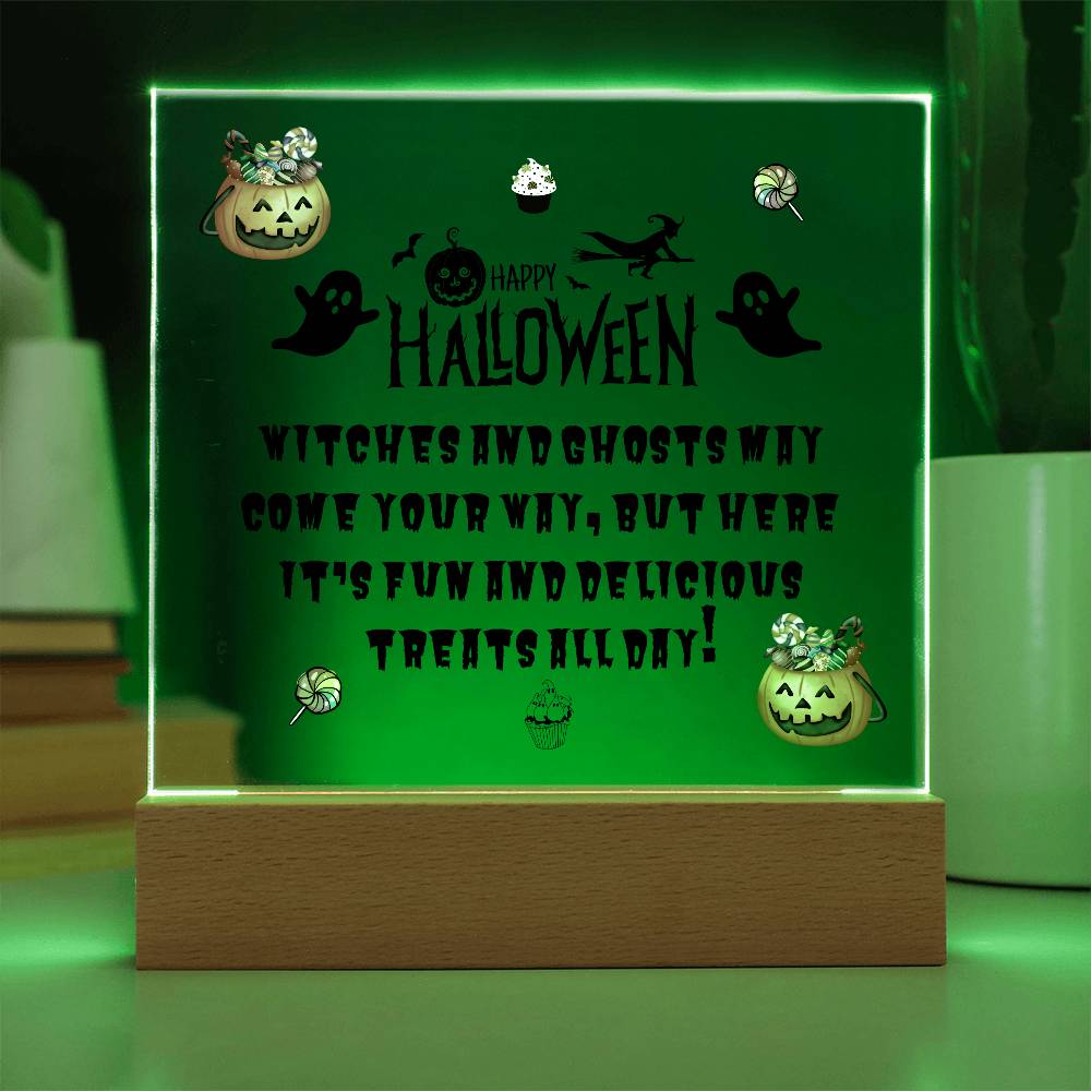 Halloween table decor with cute message on a acrylic plaque with LED base in green